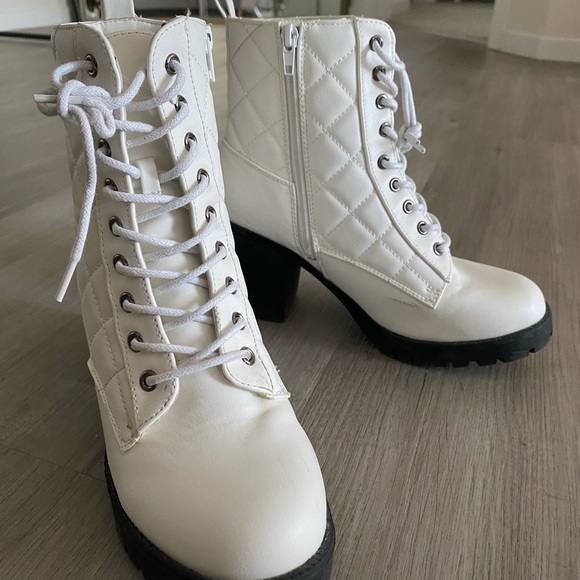 Heeled combat boots - Picture 2 of 3